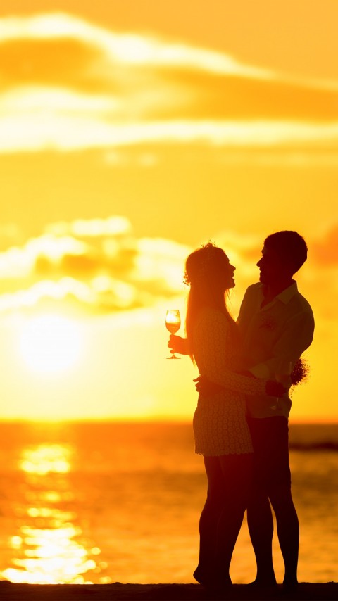 Couple In Sunset Beach 4k Mobile Wallpaper