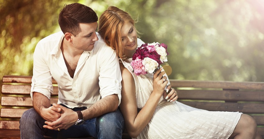 Couple Sitting On Bench Picture Background