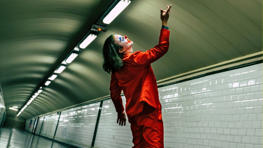 Joker In Red Suit 5K Wallpaper