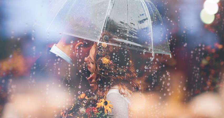 Married Couple Under The Rain Picture Wallpaper
