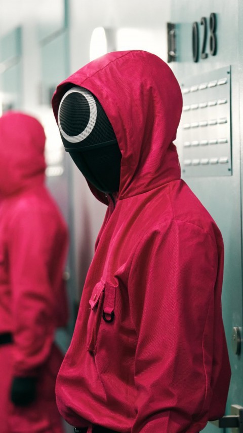 Squid Game Red Suit Agent Wallpaper For Phone