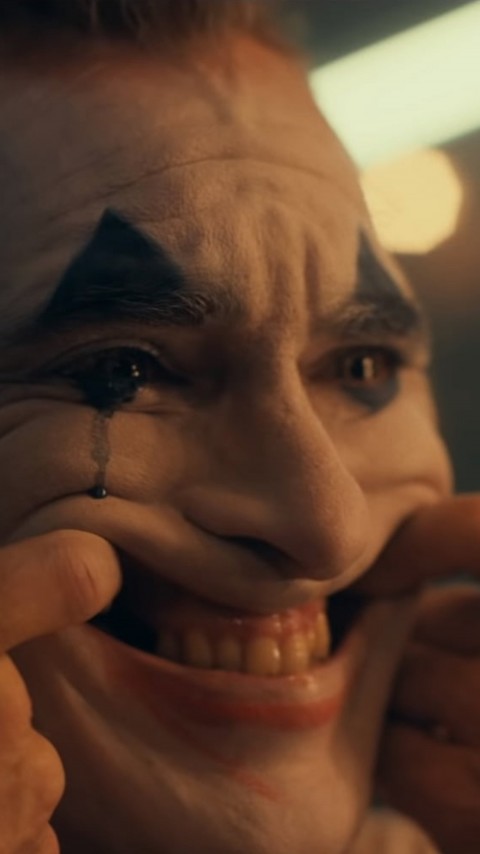 Download Joker Fingers Mouth Smile 4K Wallpaper Mobile