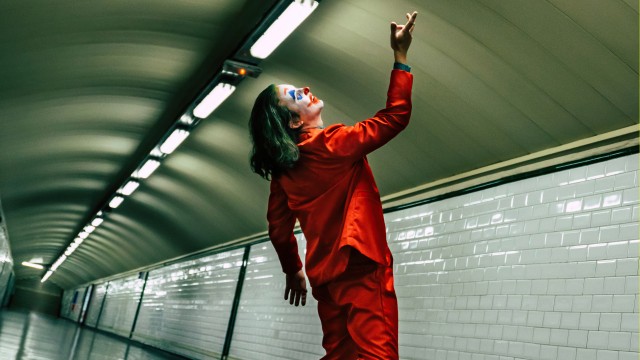 Joker In Red Suit 5K Wallpaper