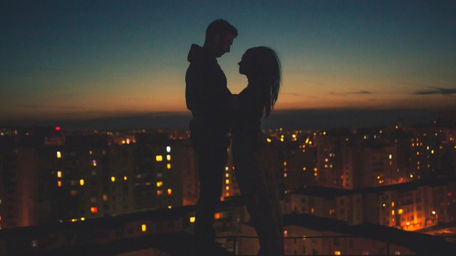 Couple Behind City View 5K Wallpaper